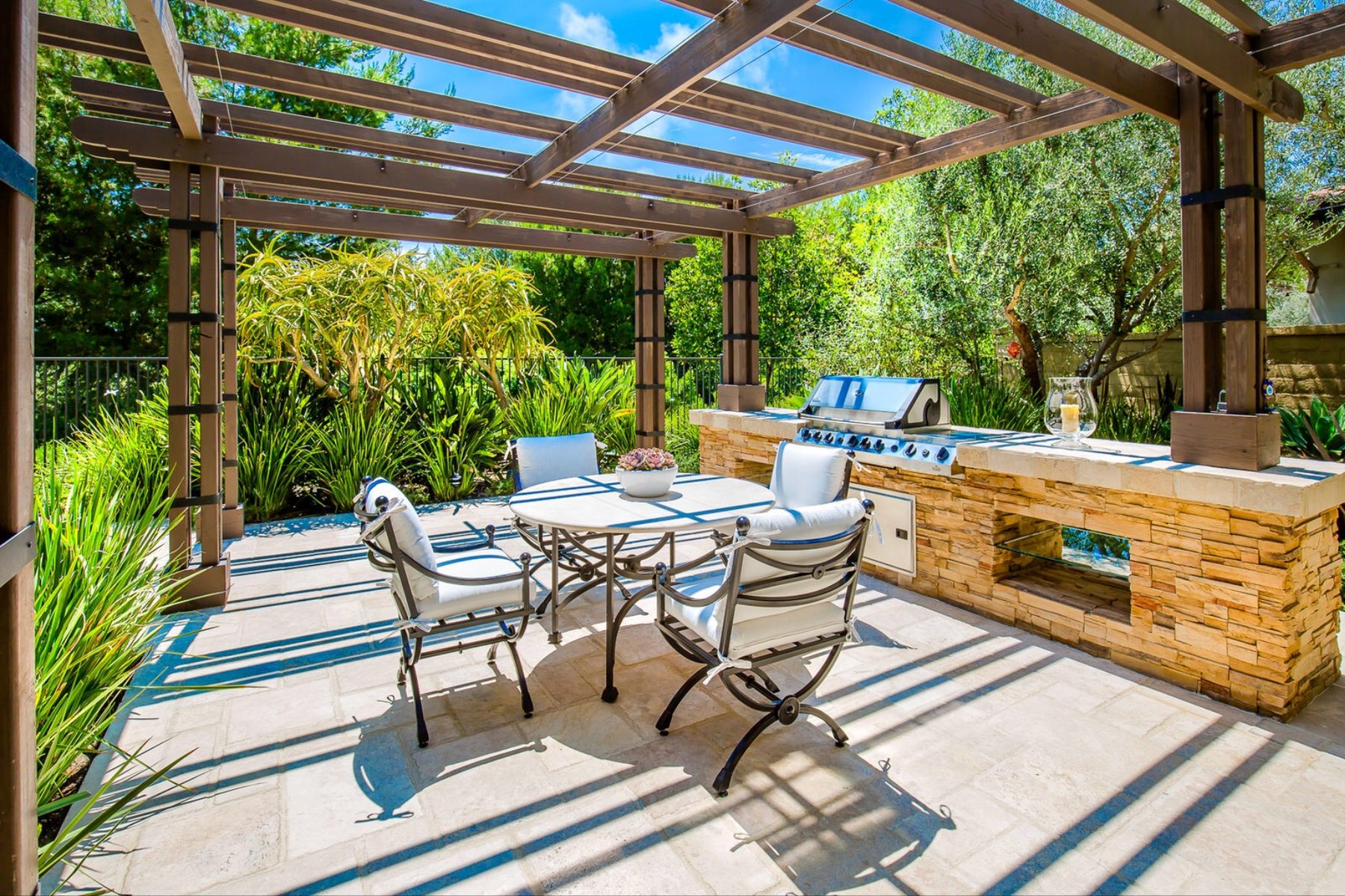 Dining terrace beneath the pergola