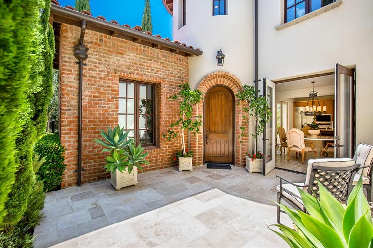 Brick courtyard and arched entry