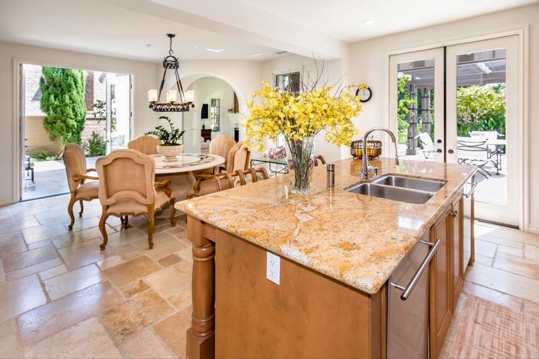 Kitchen island open to the dining terrace