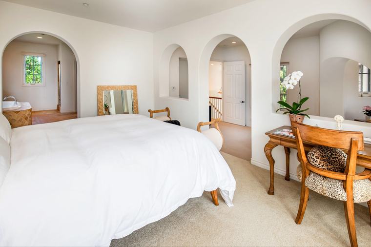 Master suite through arched openings